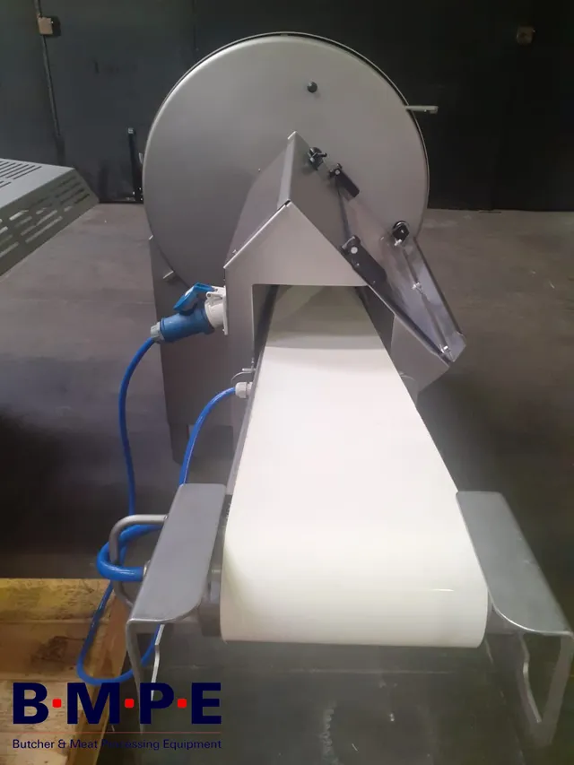Refurbished slicing machine with white outfeed conveyor belt