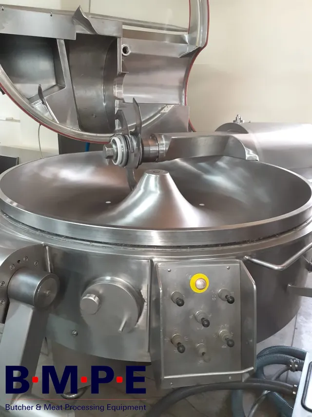 Refurbished industrial bowl cutter with open lid showing cutting knives