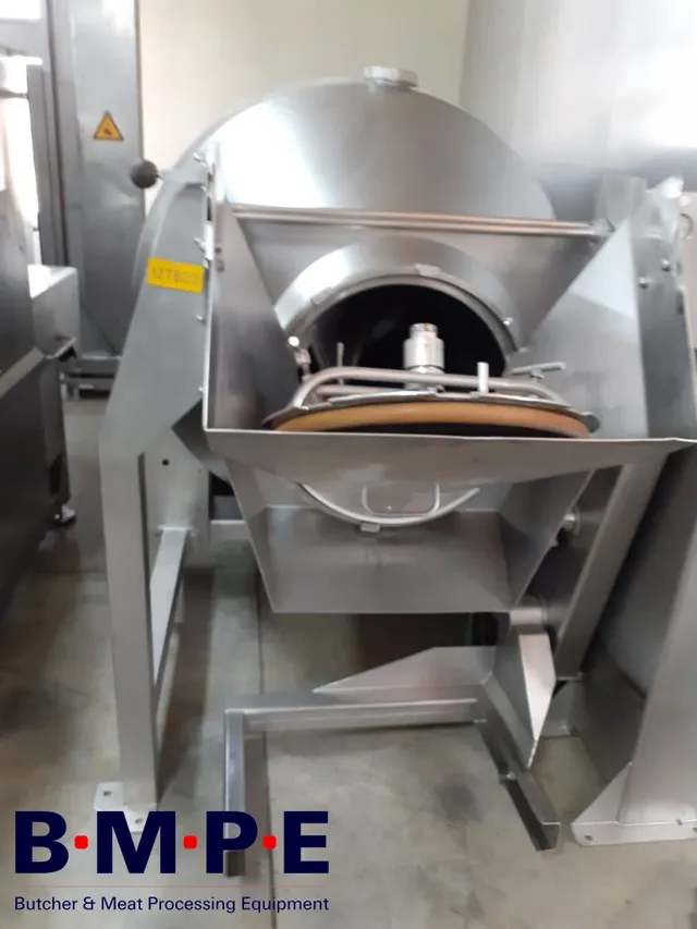Refurbished vacuum tumbler with open drum on stainless steel frame
