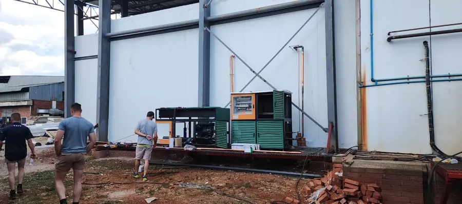 Rigging team moving the Kerres equipment into the production plant