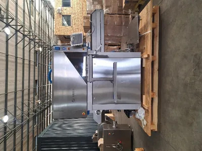 The injector still crated ahead of positioning
