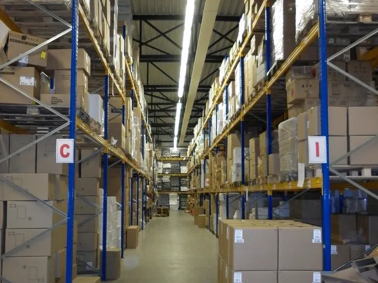 Warehouse racking stocked with boxed spares